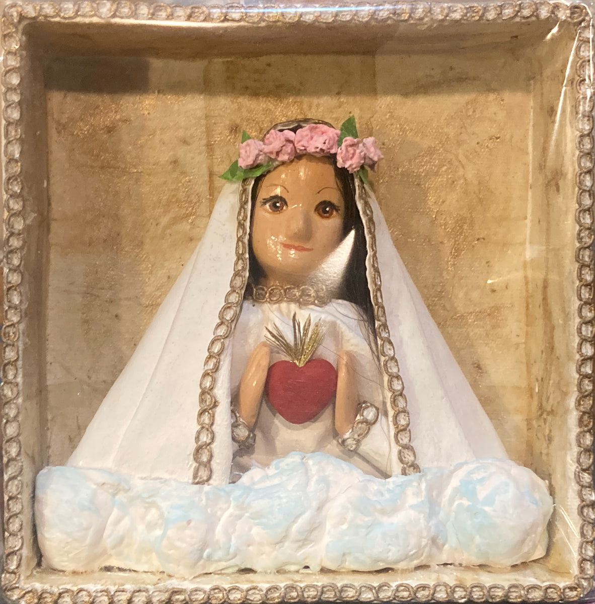 Virgen con corazón